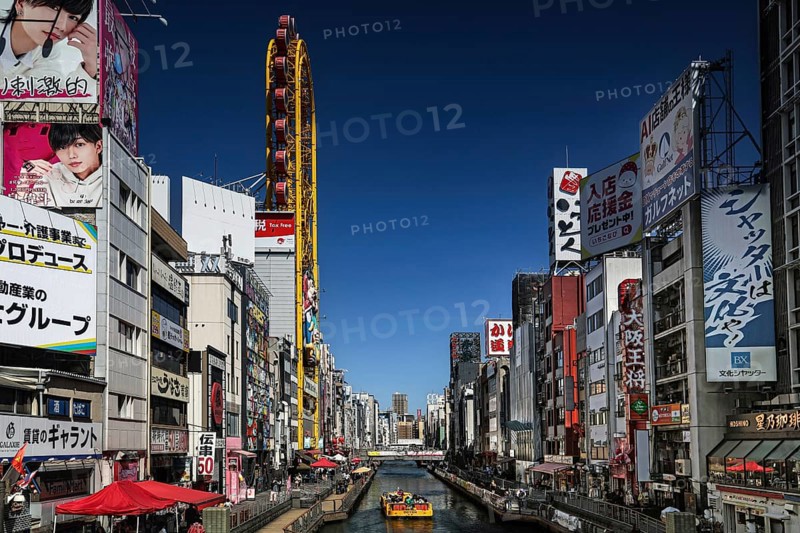 Dotonbori area with lively atmosphere, colorful billboards along the river, Osaka, Namba, Japan