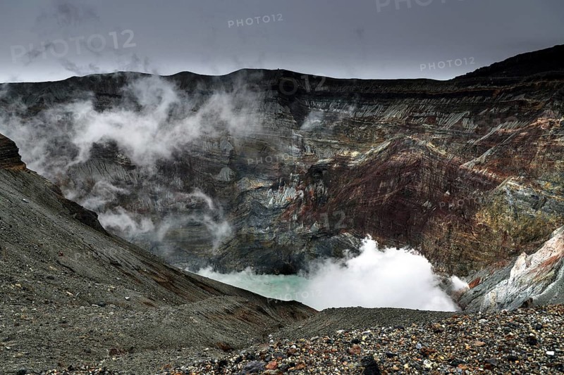 Steaming crater with geological layers and barren environment, Aso, Kumamoto, Japan
