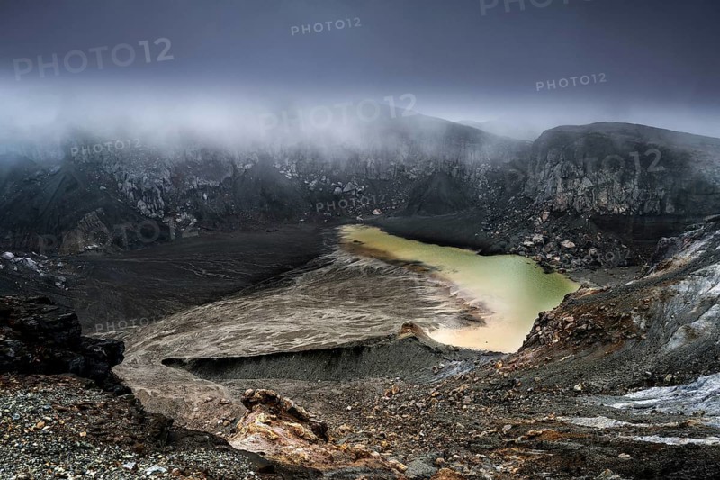 Impressive volcanic crater with cloudy seas and hazy atmosphere, Aso, Kumamoto, Japan