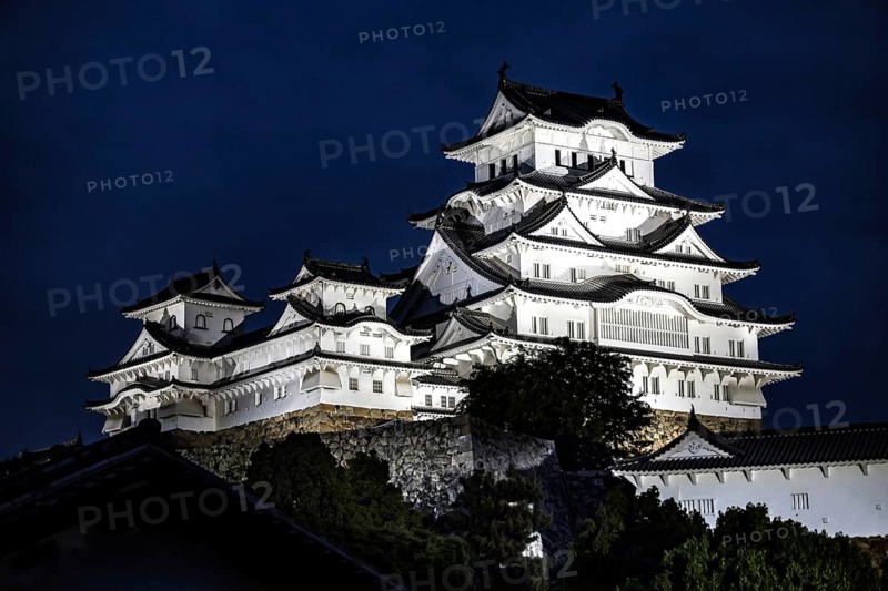 Illuminated Himeji Castle at night, an iconic Japanese architecture, Himeji, Japan