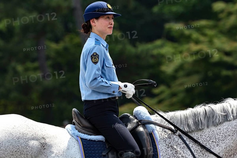 Mounted policewoman in uniform at Aoi Matsuri in Kyoto, Kyoto, Japan