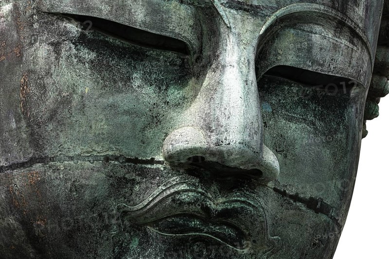 Close-up of the face of the Big Buddha at Kotokuin Temple in Kamakura, Kamakura, Kanagawa, Japan