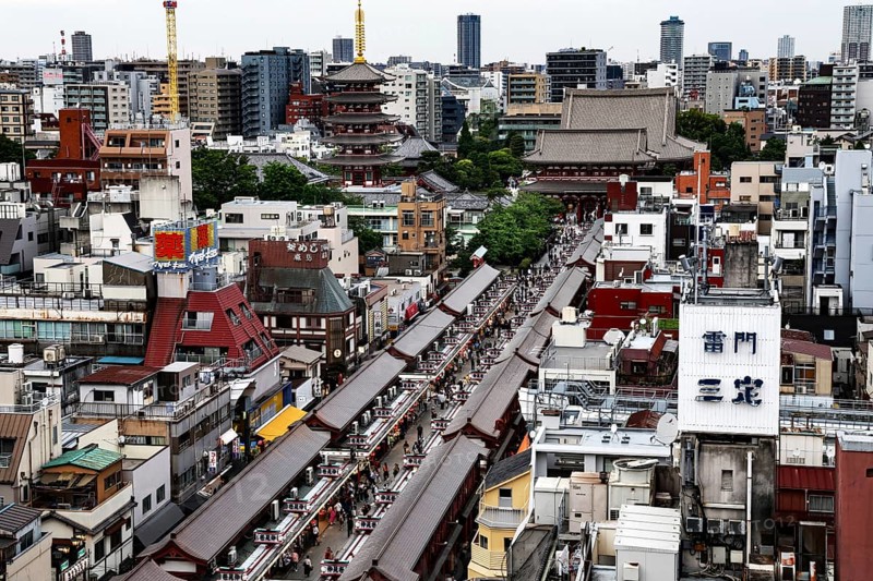 View of bustling Nakamise-dori Street with a view of Senso-ji Temple, Tokyo, Asakusa, Japan