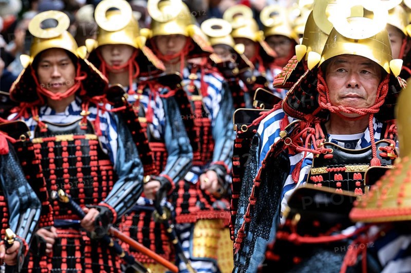 Warriors wearing elaborate armor march during a parade in Nikko, Nikko, Japan