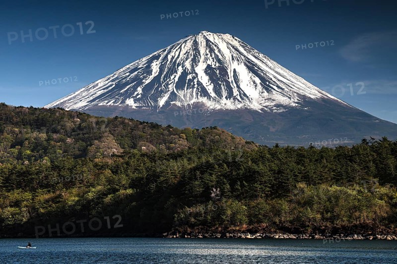View of majestic Fujiyama across a tranquil seascape