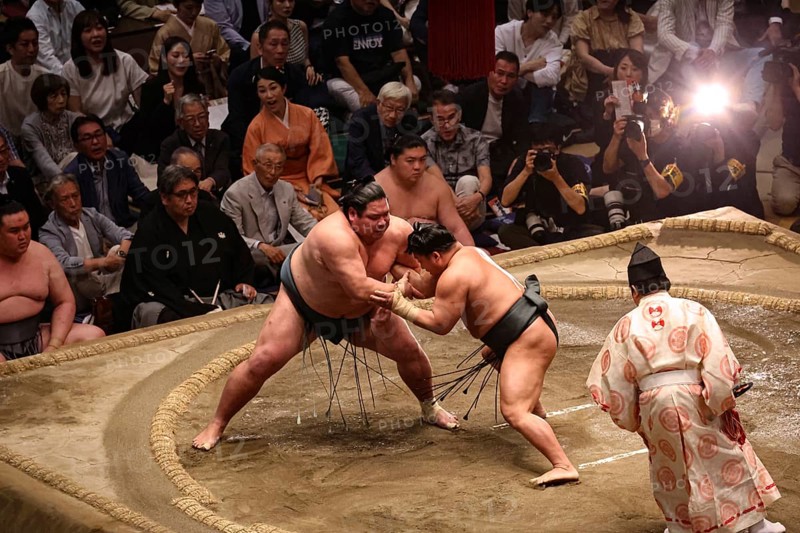 Sumo rangers in intensive duel in Kokugikan, Tokyo, Ryogoku, Japan