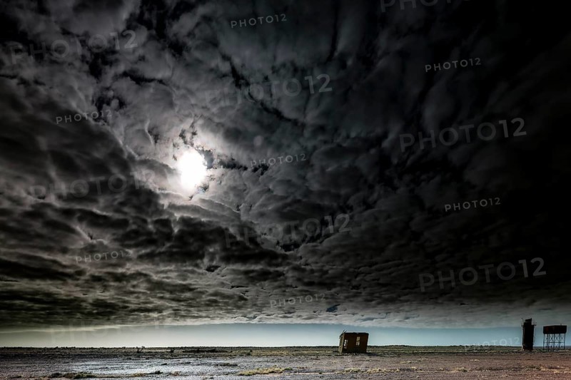 Abandoned station in gloomy sky with dramatic clouds in the outback, Oodnadatta Track, null, Australia