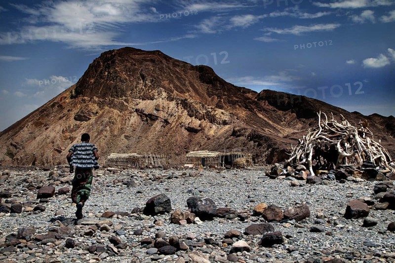 Wide landscape with mountains and boulders under blue sky in Ahmedela, Ahmedela, Ethiopia