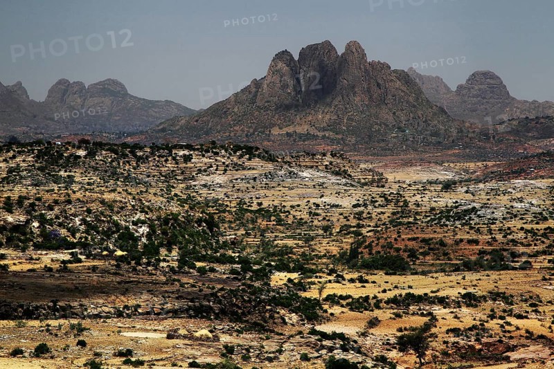 Wide landscape surrounded by the impressive Adua mountain range, Adua, Tigray, Ethiopia