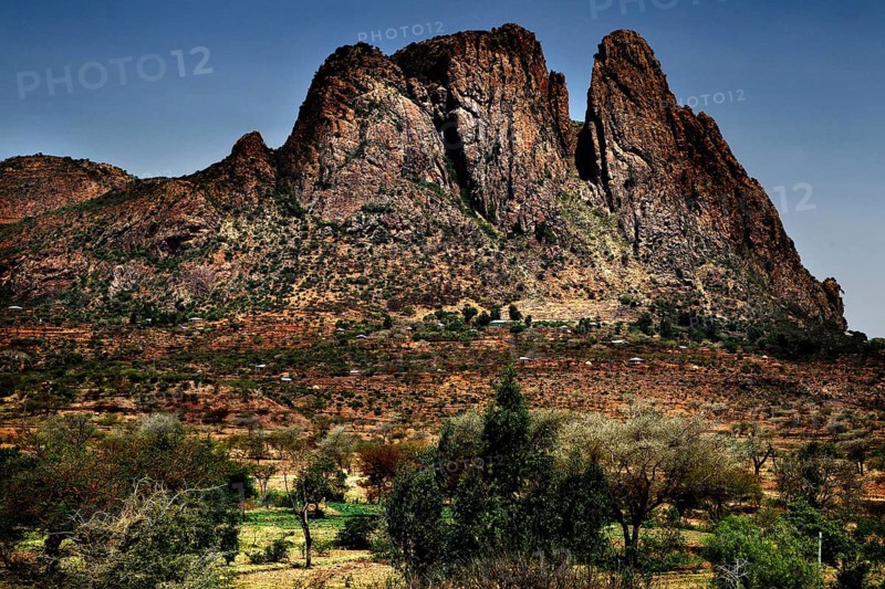Impressive mountain range with sparse vegetation and clear skies, Adua, Tigray, Ethiopia