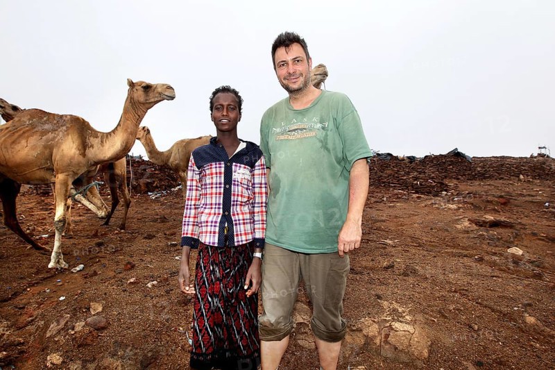A camel driver with Roland's company and camels at Erta Ale Camp, Erta Ale, Ethiopia