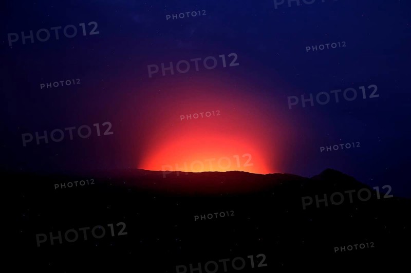 Bright red-orange crater rim of Erta Ale at night, Erta Ale, zero, Ethiopia