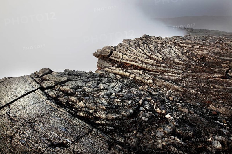 Detailed view of volcanic rocks with complex structures, zero