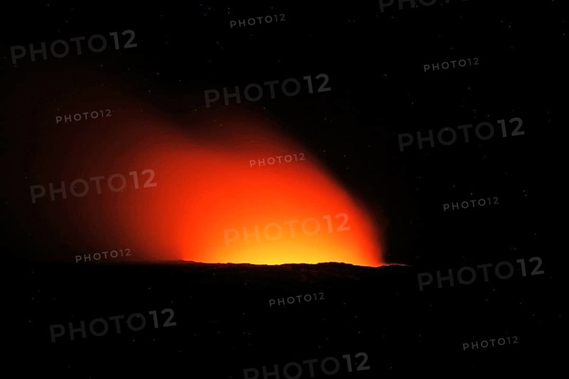 Fiery glow over the crater of a volcano at night, Erta Ale, Ethiopia