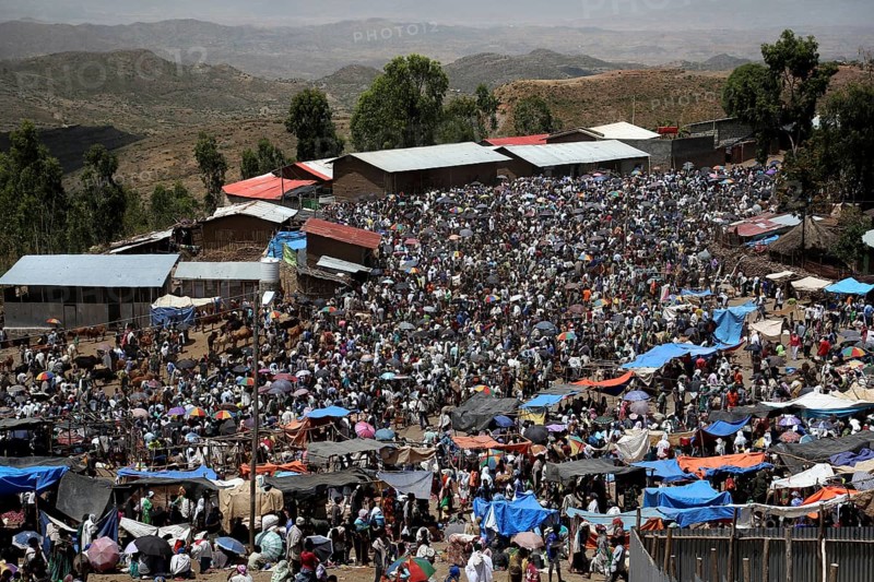 Bustling market in Lalibela full of people and colorful stalls, Lalibela, Ethiopia