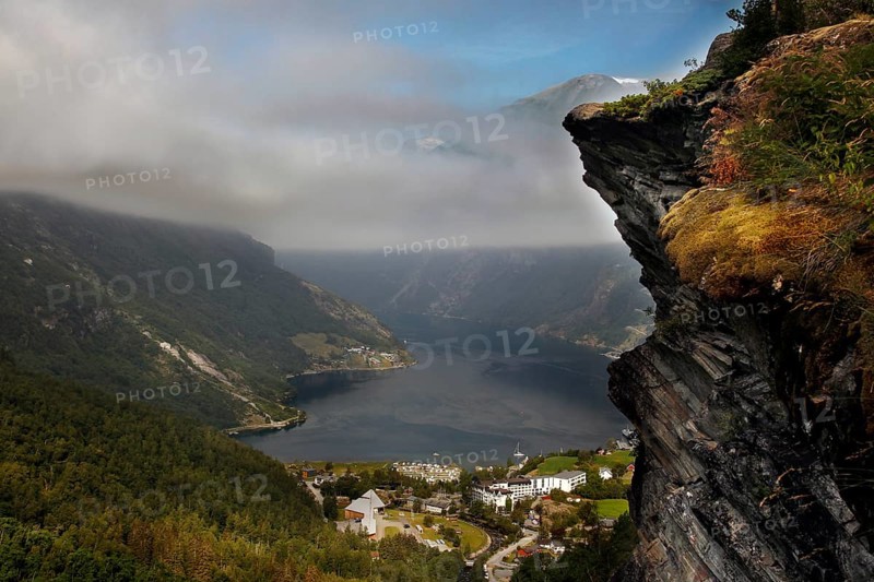 Majestic view of Geirangerfjord from Flydalsjuvet under cloudy sky, Flydalsjuvet, Geirangerfjord, Møre og Romsdal, Norway