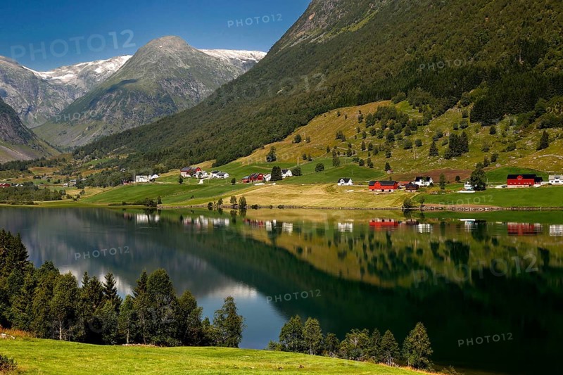 Tranquil landscape with reflecting mountain reflections in Fjærlandsfjord