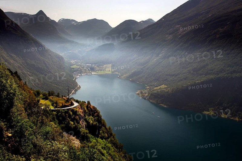 View of Geiranger and a picturesque fjord landscape from the Ørnevegen Serpentine Road, Geiranger, Møre og Romsdal, Norway