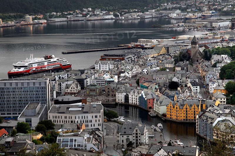 Panoramic view of Ålesund's old town with a Hurtigruten ship in the harbor, Ålesund, Norway