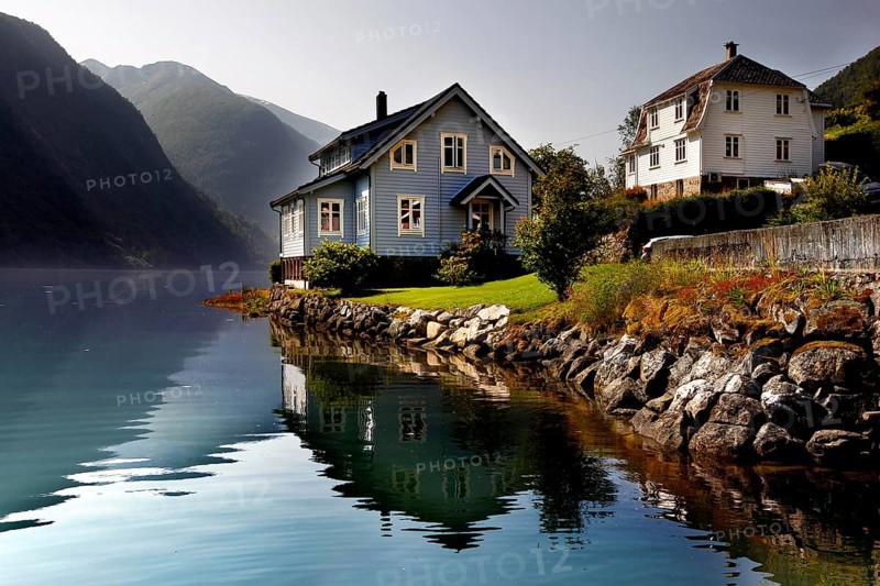 Houses on quiet Fjærlandsfjord with mountains in the background, Mundal, null, Norway