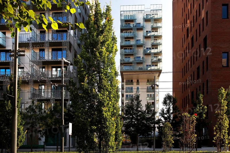 Modern new buildings between trees in Oslo, urban ambiance under clear skies, Oslo, Bydel Gamle Oslo, Norway