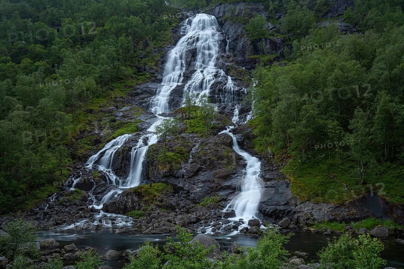 Summer day visiting Espelandsfossen falls near Bergen, scenic nature and flowing water, Vestland, Norway