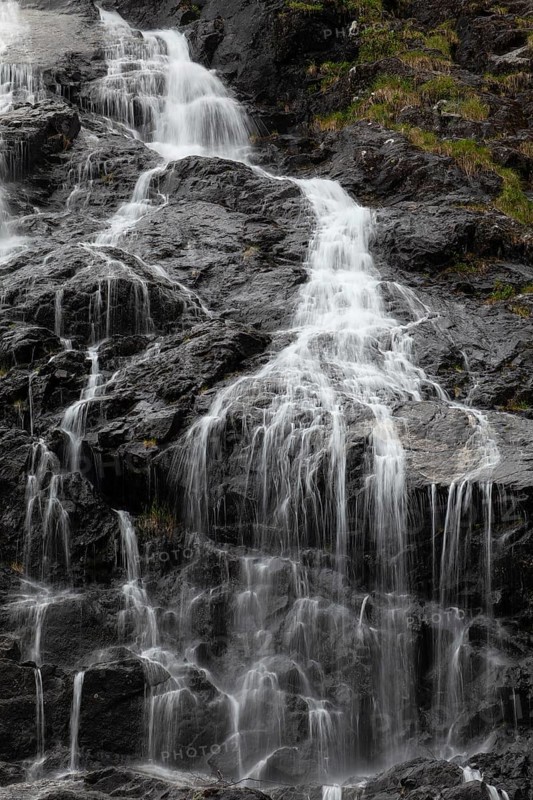 Summer day visiting Espelandsfossen falls near Bergen, scenic nature and flowing water, Vestland, Norway