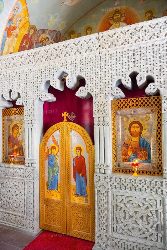 Artfully decorated church door with icons and detailed reliefs in a sacred space, domed church by Kvemo Mleta Lomis, Kvemo Mleta, Mtskheta-Mtianeti region, Georgian Military Highway, High Caucasus, Georgia