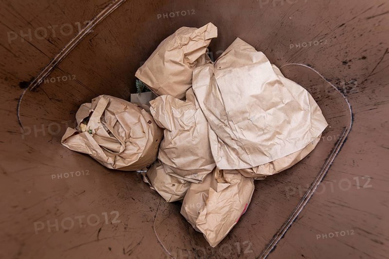 Full brown organic waste bin for food disposal. Germany