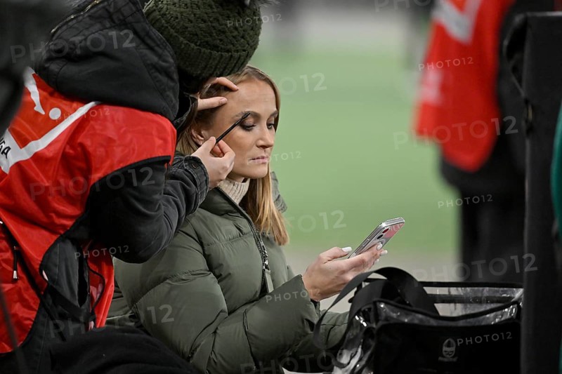 SKY presenter reporter Nele Ocik formerly Schenker with smartphone cell phone, gets makeup MHPArena, MHP Arena Stuttgart, Baden-Württemberg, Germany