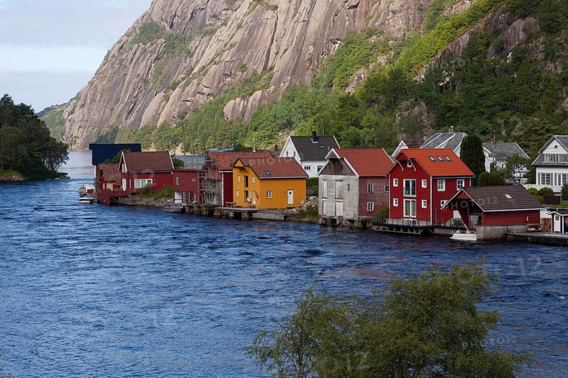 Historical wooden houses in a sleepy village by the river. Summer, Sireåna (Sireåna), Agder, Norway