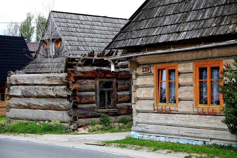 Traditional wooden houses in the village of Chocholow, Podhale-style wooden architecture, listed by UNESCO, near Zakopane, Lesser Poland Voivodeship, Poland