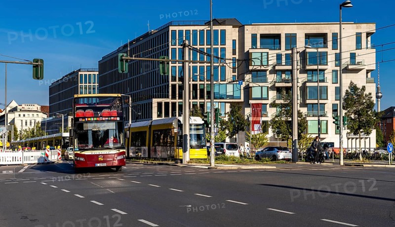 Berlin road traffic with buses, trams and pedestrians at and around the main train station, Berlin, Germany