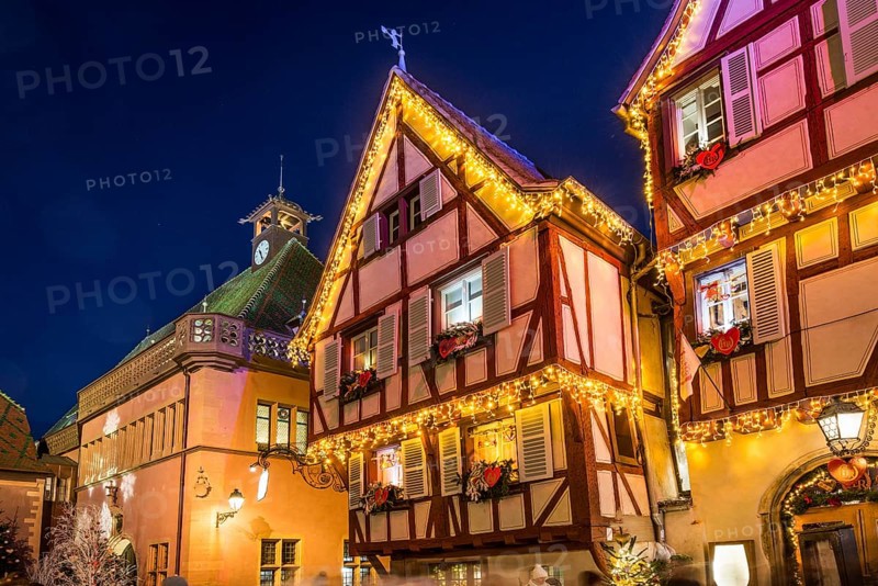 Colourfully illuminated and Christmassy decorated half-timbered houses, old town, blue hour, Colmar, Haut-Rhin department, Alsace, France