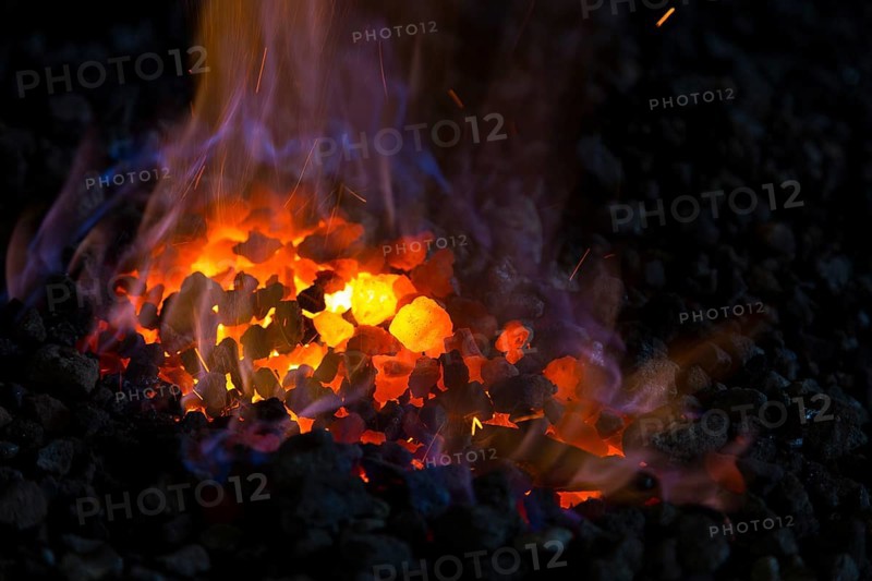 A blacksmith forging, working at the Ehnert forge in Dresden-Bühlau, Saxony, Germany