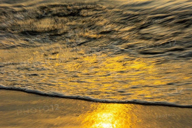 Waves at sunset on the west beach of Fischland-Darß-Zingst, Baltic Sea, Ahrenshoop, Mecklenburg-Western Pomerania, Germany