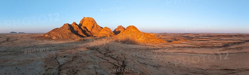 Aerial view, sunset, mountains in the desert, Spitzkoppe summit, Namib desert, Namibia