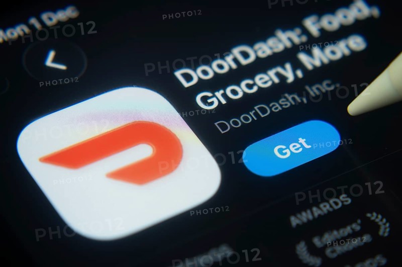 Dhaka, Bangladesh- 01 Dec 2025: A close-up of the DoorDash app icon in the App Store on an iPad screen