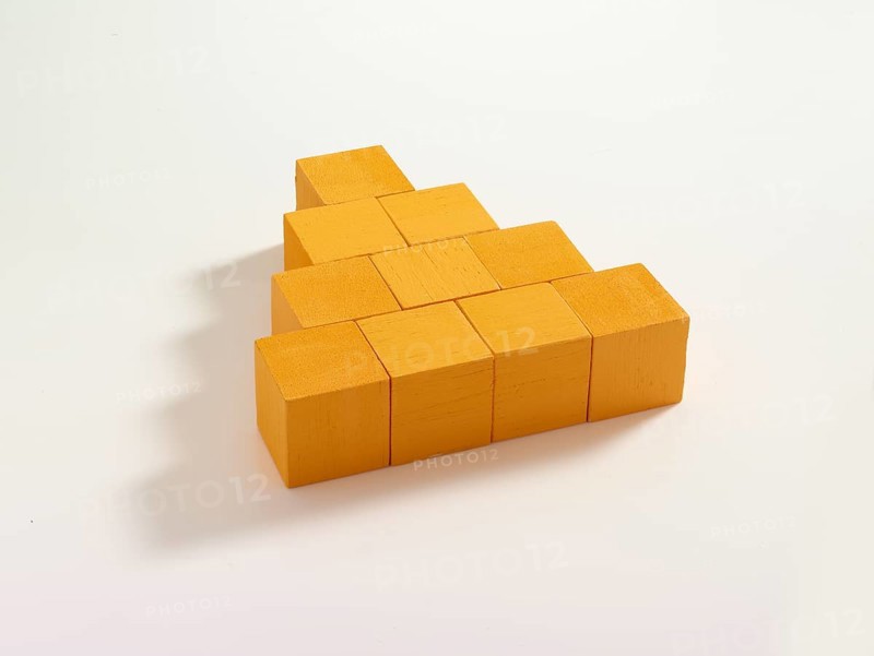 10 yellow wooden cubes against a white background