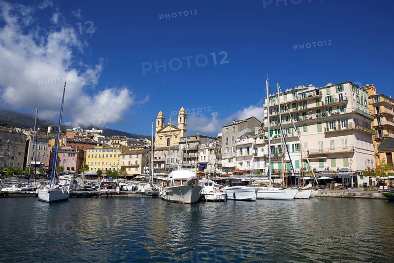 Old port with marina and church of Saint Jean-Baptiste à Bastia or church of St. John the Baptist, Port de Plaisance or Vieux Port, old town, Bastia, Haute-Corse department, Corsica, France