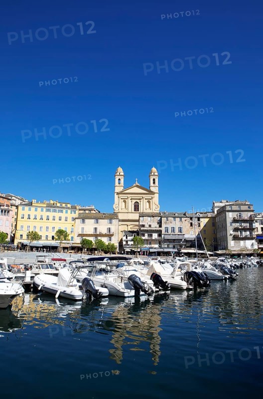 Old port with marina and church of Saint Jean-Baptiste à Bastia or church of St. John the Baptist, Port de Plaisance or Vieux Port, old town, Bastia, Haute-Corse department, Corsica, France