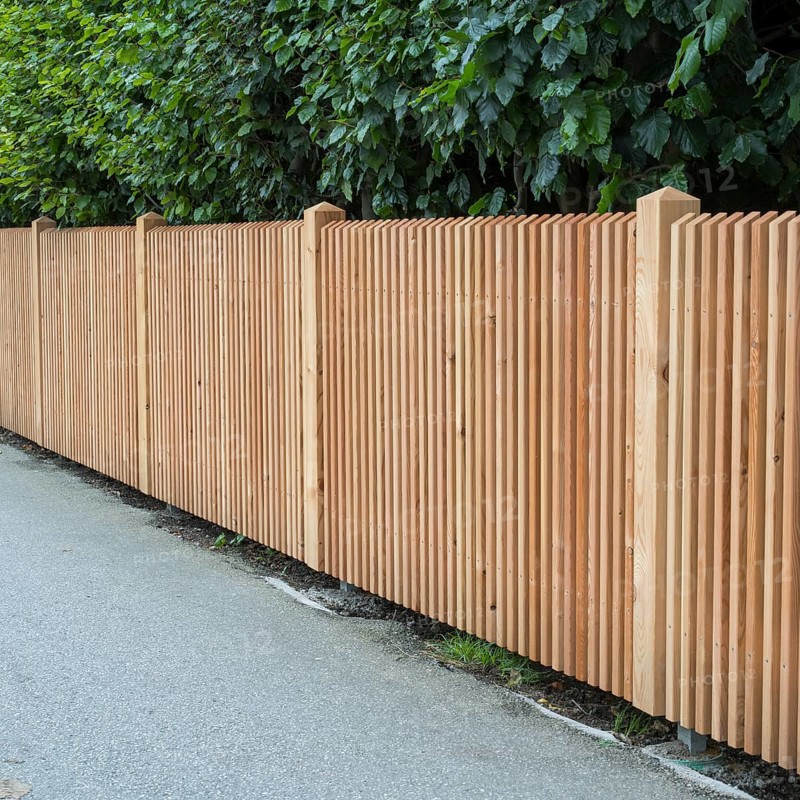 Wooden fence on the side of the road, vertical slats, town of Tegernsee, Upper Bavaria, Bavaria, Germany
