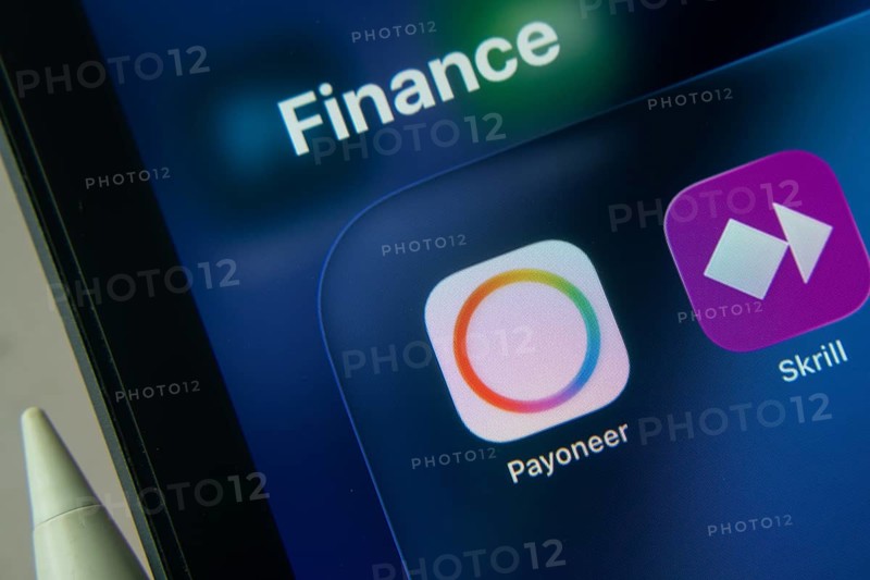 16 Nov 2025- Dhaka, Bangladesh: Close-up of Payoneer app icons on a iPad screen
