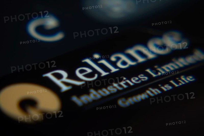 Dhaka, Bangladesh- 02 Dec 2025: A Close-up of a laptop screen is displaying the Reliance Industries web interface in a browser