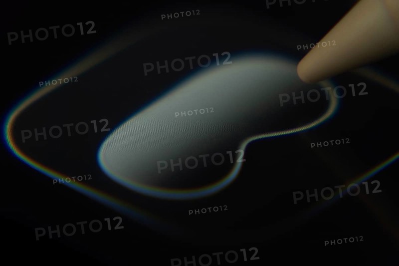 Dhaka, Bangladesh- 06 Dec 2025: Close-up of the Apple Vision Pro app on a screen with a stylus pointing at it