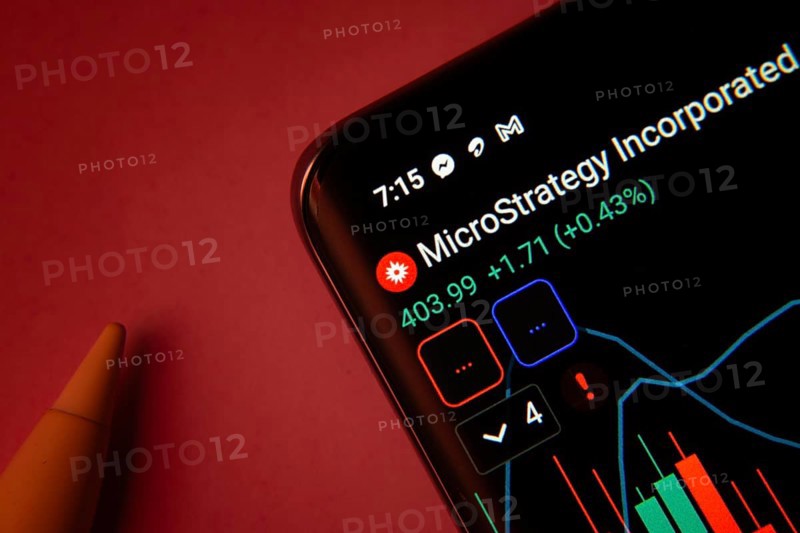 Dhaka, Bangladesh- 08 Sep 2025: Close-up of a phone screen showing MicroStrategy stock market data with a candlestick chart