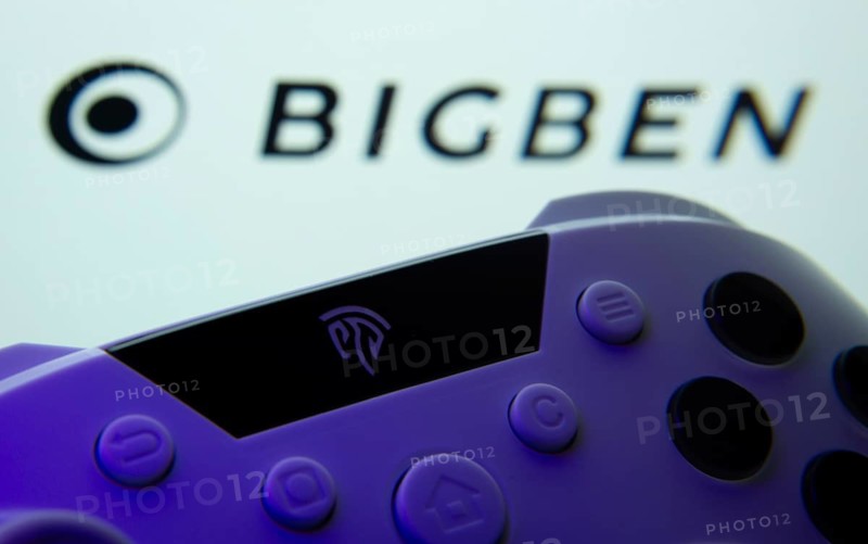 Dhaka, Bangladesh- 24 Mar 2025: A close-up of a gamepad with the Bigben seen on screen in the background