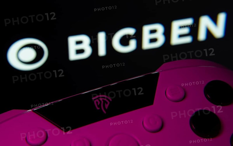 Dhaka, Bangladesh- 24 Mar 2025: A close-up of a gamepad with the Bigben Interactive seen on screen in the background
