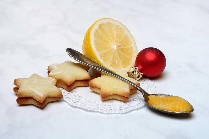 Lemon cookies, lemon and spoon with lemon curd