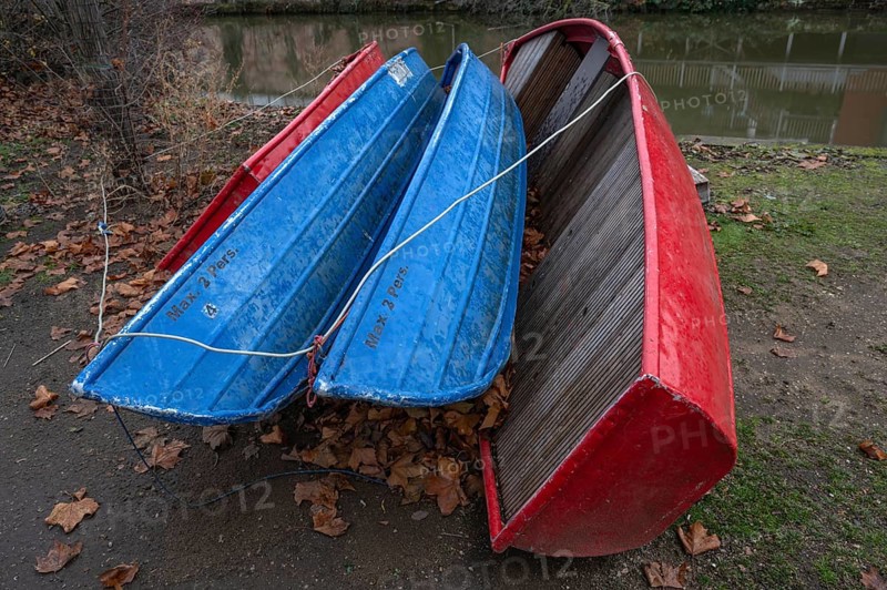 Assembled rowing boats on the banks of Pegnitz, river in Nuremberg, Middle Franconia, Bavaria, Germany